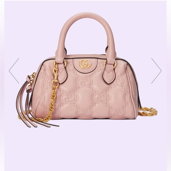 Gucci Handbags - Gucci GG matelassé mini bag in pink leather